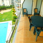 Dulpex moderno con amplia terraza con vistas al mar, parking y piscina Roses