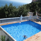 En venta casa reformada de 3 habitaciones con terraza, parking y piscina en Roses, Costa Brava